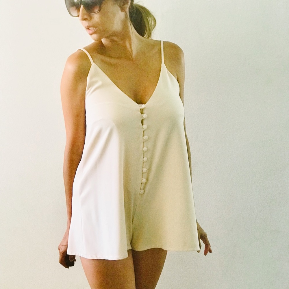 Cream button romper size Small